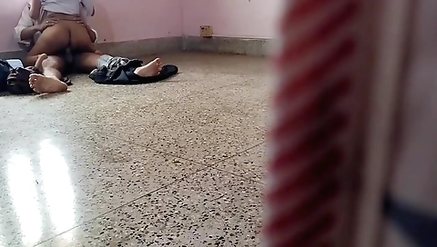 Indian chick is wearing a red dress in a webcam video