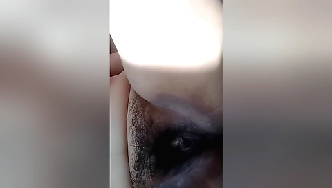 Hot masturbation with hairy pussy in amateur video