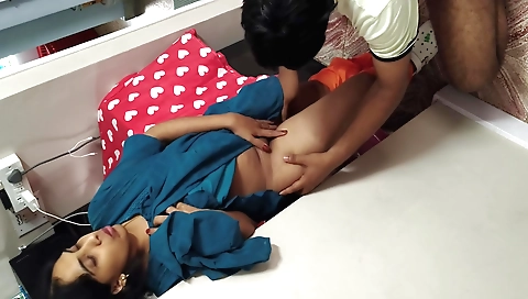 Horny brunette girl gives a blowjob to a boyfriend