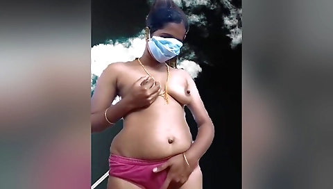 Solo girl in a panty record video for the public eye
