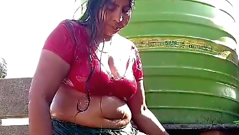 Indian woman stretches her body as she is in the house