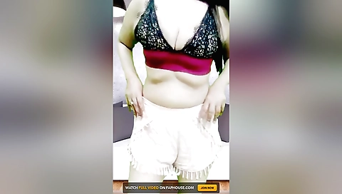 Indian brunette with a great body masturbates in bed