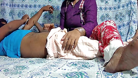 Indian girl with a red dress plays with her boy's cock