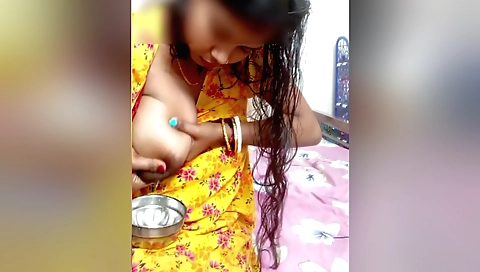 Indian brunette in a homemade video showing nipples