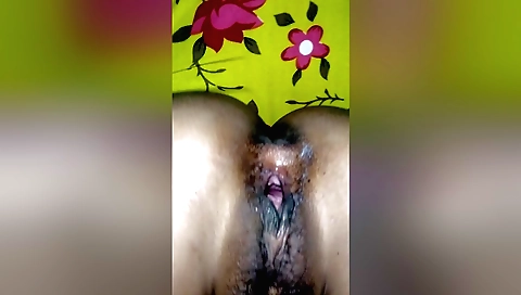 Hot indian girl with hairy pussy is a fan of making it wet