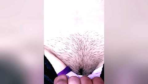 Indian hairy girl takes off her clothes and rubs her pussy