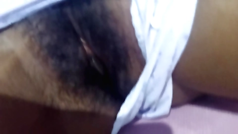 Indian brunette amateur milf fucks her hairy pussy