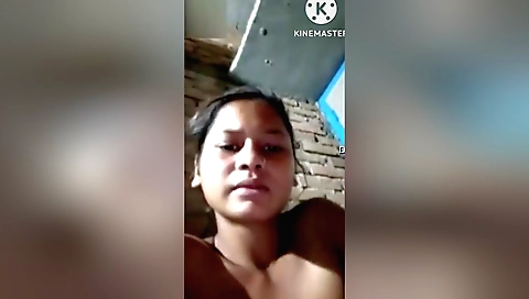Hot brunette girl fingers her pussy in a solo vid 03