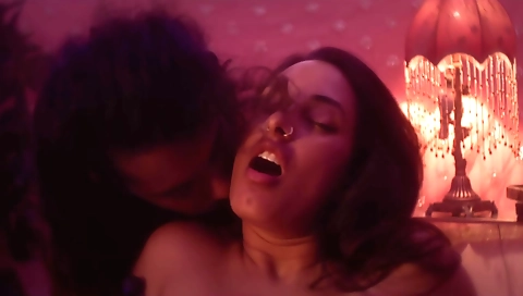 Sexy brunette in a sexy red dress enjoys sex at breakfast