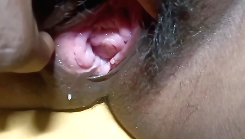 Hairy woman with hairy bush masturbating in solo video