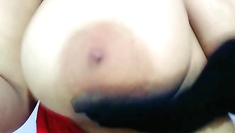 Indian woman with big tits and a sexy ass in a solo video
