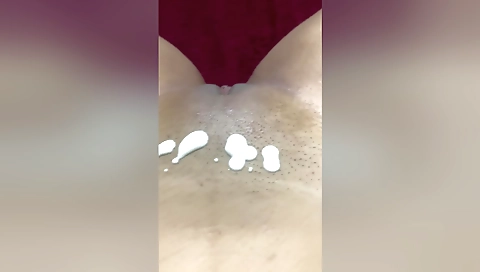 Indian woman is showing off her pussy with her hands