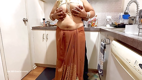 Amateur brunette sucks and rides cock in the kitchen