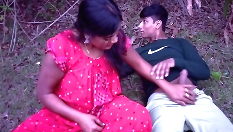 Indian brunette outdoors in a jungle doing something hot
