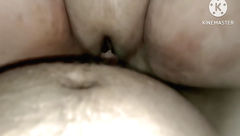 A milf with a hot mouth fucks while holding a big dildo