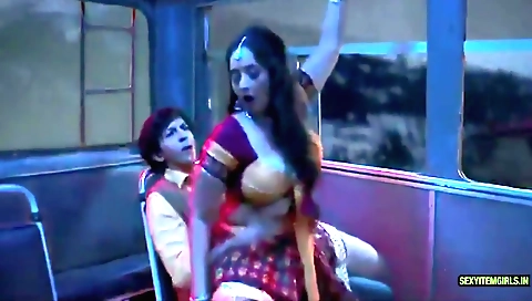 A big tits brunette milf fucks young guy on the bus