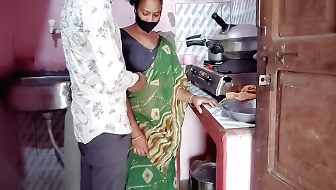 Indian brunette stepmother and her husband in kitchen
