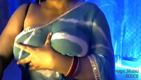 Bhabhi is wearing a sexy bra and is showing off her boobs
