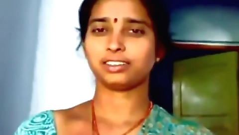 Indian beautie in a long black dress shows her perfect body
