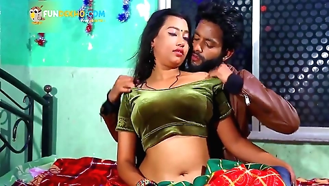 Indian woman is having fun on the bed in this kinky movie